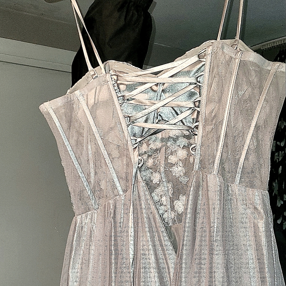 Light silver prom or homecoming dress, Brand is blonde, size 9